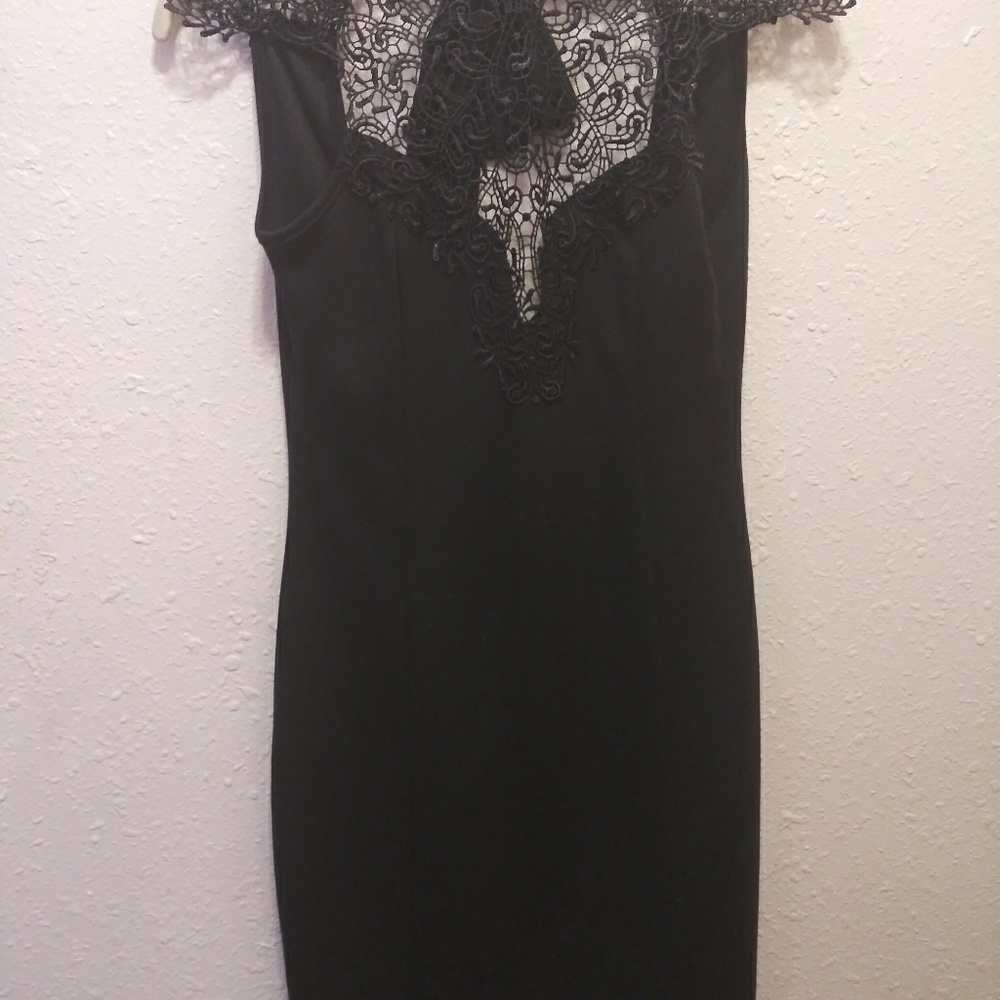 Sexy little black dress with lace at the top